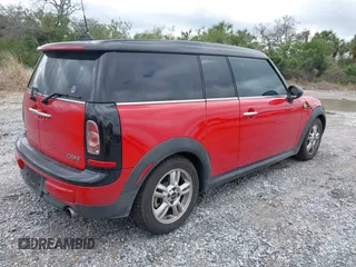 2013 MINI Clubman z VIN WMWZF3C50DT490262, wystawiony jako IAAI lot #41674033 z przebiegiem 194 622 mil mil oraz . Historia ofert i sprzedaży dostępna na DreamBid. Obrazek 4.