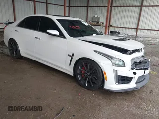 2019 Cadillac CTS-V z VIN 1G6A15S66K0143718, wystawiony jako IAAI lot #42177909 z przebiegiem 52 048 mil mil oraz . Historia ofert i sprzedaży dostępna na DreamBid. Obrazek 1.