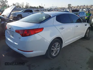 2013 Kia Optima LX with VIN KNAGM4A72D5362553, listed as a IAAI auction lot 42004593 with 127,918 mi miles. Bid and sale history available at carsss.com. Image 4.
