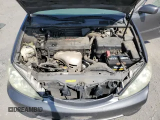 2005 Toyota Camry LE z VIN 4T1BE30K35U534439, wystawiony jako Copart lot #59994085 z przebiegiem 151 191 mil mil oraz Szkoda całkowita • Salvage title. Historia ofert i sprzedaży dostępna na DreamBid. Obrazek 11.