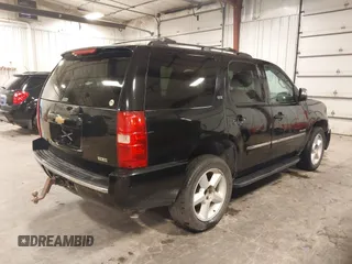 2012 Chevrolet Tahoe LTZ with VIN 1GNSKCE02CR297261, listed as a IAAI auction lot 40255137 with 283,110 mi miles and . Bid and sale history available at DreamBid. Image 4.