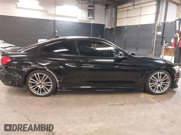 2015 BMW 4 Series 428i z VIN WBA3N3C59FK234025, wystawiony jako IAAI lot #42301785 z przebiegiem 66 729 mil mil oraz . Historia ofert i sprzedaży dostępna na DreamBid. Obrazek 6.