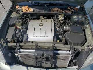 2005 Cadillac DeVille z VIN 1G6KD54Y25U234041, wystawiony jako Copart lot #57306265 z przebiegiem 200 302 mil mil oraz Szkoda całkowita • Salvage title. Historia ofert i sprzedaży dostępna na DreamBid. Obrazek 11.