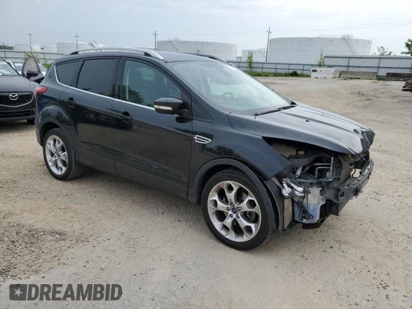 2015 Ford Escape Titanium z VIN 1FMCU9J99FUA90281, wystawiony jako Copart lot #59972565 z przebiegiem 125 351 mil mil oraz Czysty tytuł • Clean title. Historia ofert i sprzedaży dostępna na DreamBid. Obrazek 4.