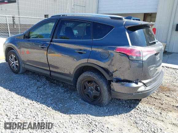 2016 Toyota RAV4 LE with VIN JTMZFREV5GJ078051, listed as a IAAI auction lot 41858381 with 97,032 mi miles and . Bid and sale history available at DreamBid. Image 3.