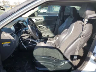2013 Hyundai Veloster w/Gray Int with VIN KMHTC6AD6DU154098, listed as a Copart auction lot 77260374 with 159,049 mi miles and Non Repairable. Bid and sale history available at carsss.com. Image 7.