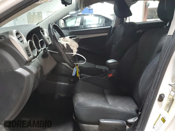 2010 Pontiac Vibe w/1SA with VIN 5Y2SP6E84AZ419732, listed as a Copart auction lot 79696054 with 228,520 mi miles and Salvage Title. Bid and sale history available at carsss.com. Image 7.