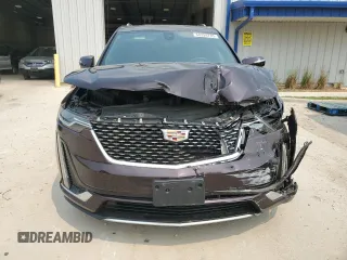 2020 Cadillac XT6 AWD Premium Luxury with VIN 1GYKPDRS4LZ129224, listed as a Copart auction lot 60328745 with 76,290 mi miles and Salvage title. Bid and sale history available at DreamBid. Image 5.