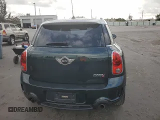 2013 MINI Countryman S ALL4 z VIN WMWZC5C58DWP31357, wystawiony jako Copart lot #51438035 z przebiegiem 98 138 mil mil oraz Szkody całkowita. Historia ofert i sprzedaży dostępna na DreamBid. Obrazek 6.