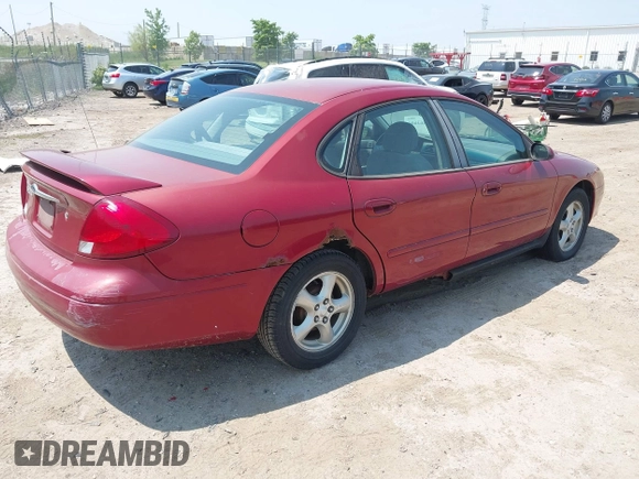 2003 Ford Taurus SE Standard with VIN 1FAFP53UX3G124702, listed as a IAAI auction lot 42463606 with 129,874 mi miles and . Bid and sale history available at DreamBid. Image 4.