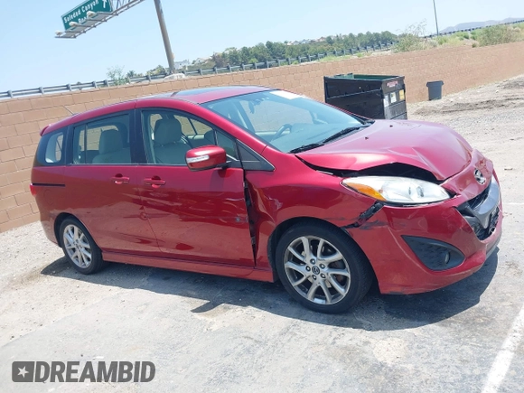 2015 Mazda 5 Grand Touring with VIN JM1CW2DL6F0190312, listed as a IAAI auction lot 42433782 with 79,140 mi miles and . Bid and sale history available at DreamBid. Image 13.