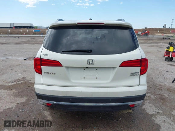 2017 Honda Pilot Touring with VIN 5FNYF6H9XHB034001, listed as a IAAI auction lot 42092549 with 142,422 mi miles and . Bid and sale history available at DreamBid. Image 16.