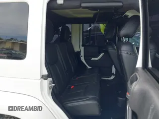 2015 Jeep Wrangler Unlimited Rubicon Hard Rock с VIN 1C4HJWFG7FL684057, выставлен на аукционе IAAI как лот 41963885 с пробегом 103 240 миль миль и . История ставок и продаж доступна на DreamBid. Изображение 8.
