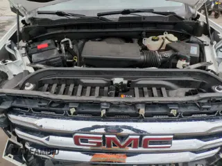 2019 GMC Sierra 1500 SLE z VIN 1GTR9BED4KZ350203, wystawiony jako Copart lot #52871135 z przebiegiem 59 218 mil mil oraz Szkoda całkowita • Salvage title. Historia ofert i sprzedaży dostępna na DreamBid. Obrazek 16.