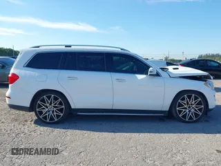 2014 Mercedes-Benz GL-Class GL 450 with VIN 4JGDF7CE1EA387056, listed as a IAAI auction lot 41899945 with 126,842 mi miles. Bid and sale history available at carsss.com. Image 14.