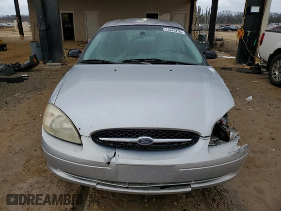 2000 Ford Taurus SE with VIN 1FAFP532XYA141783, listed as a Copart auction lot 43949795 with 203,939 mi miles and Salvage Title. Bid and sale history available at DreamBid. Image 5.