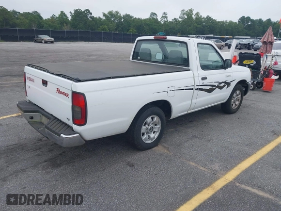2000 Nissan Frontier XE with VIN 1N6DD21S5YC305132, listed as a IAAI auction lot 42695081 with 111,427 mi miles and . Bid and sale history available at DreamBid. Image 4.