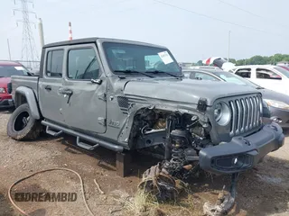 2020 Jeep Gladiator Overland with VIN 1C6HJTFG0LL169628, listed as a IAAI auction lot 42476729 with 102,874 mi miles and . Bid and sale history available at DreamBid. Image 6.