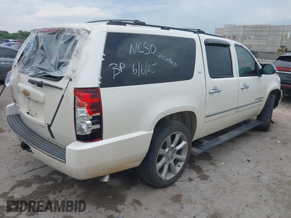 2013 Chevrolet Suburban LTZ with VIN 1GNSCKE00DR209381, listed as a IAAI auction lot 42469271 with Not provided miles and . Bid and sale history available at DreamBid. Image 4.