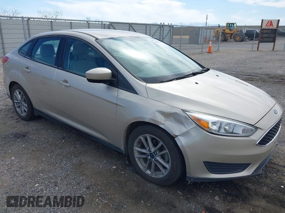2018 Ford Focus SE with VIN 1FADP3FE7JL230870, listed as a IAAI auction lot 42021541 with 84,000 mi miles. Bid and sale history available at carsss.com. Image 1.