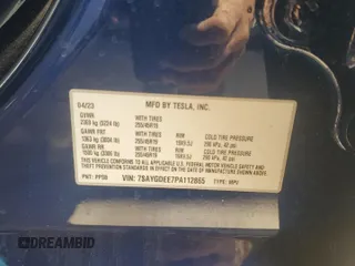 2023 Tesla Model Y Long Range with VIN 7SAYGDEE7PA112865, listed as a Copart auction lot 54626685 with 10,720 mi miles and Salvage Title. Bid and sale history available at DreamBid. Image 12.