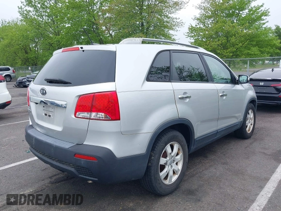 2012 Kia Sorento LX with VIN 5XYKTDA60CG296159, listed as a IAAI auction lot 42197638 with 198,676 mi miles. Bid and sale history available at carsss.com. Image 12.