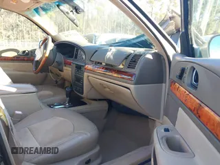 2002 Lincoln Continental with VIN 1LNHM97V12Y699605, listed as a IAAI auction lot 41235748 with 1 mi miles. Bid and sale history available at carsss.com. Image 5.
