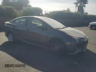 2016 Toyota Prius Two z VIN JTDKBRFU7G3520531, wystawiony jako Copart lot #57690325 z przebiegiem Nie podano mil oraz Czysty tytuł • Clean title. Historia ofert i sprzedaży dostępna na DreamBid. Obrazek 4.