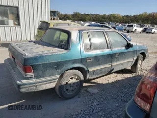 1995 Plymouth Acclaim z VIN 3P3AA4639ST552970, wystawiony jako Copart lot #76737854 z przebiegiem 113 119 mil mil oraz Szkody całkowita. Historia ofert i sprzedaży dostępna na DreamBid. Obrazek 3.