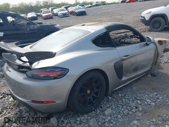 2017 Porsche 718 Cayman z VIN WP0AA2A89HS270863, wystawiony jako IAAI lot #42039112 z przebiegiem Nie podano mil oraz . Historia ofert i sprzedaży dostępna na DreamBid. Obrazek 4.