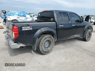 2006 Nissan Frontier Nismo z VIN 1N6AD07W26C438235, wystawiony jako Copart lot #60685544 z przebiegiem 164 137 mil mil oraz Szkoda całkowita • Salvage title. Historia ofert i sprzedaży dostępna na DreamBid. Obrazek 3.