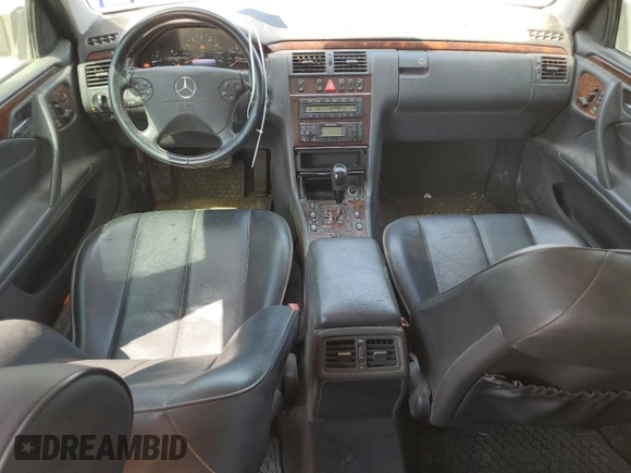 2003 Mercedes-Benz E-Class AWD with VIN WDBJH82J93X088042, listed as a Copart auction lot 70566864 with 167,374 mi miles and Salvage Title. Bid and sale history available at carsss.com. Image 8.
