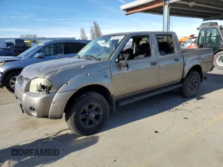 2004 Nissan Frontier XE z VIN 1N6ED27T94C461253, wystawiony jako Copart lot #86311014 z przebiegiem 174 836 mil mil oraz Szkoda całkowita • Salvage title. Historia ofert i sprzedaży dostępna na DreamBid. Obrazek 1.