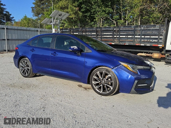 2020 Toyota Corolla SE with VIN 5YFS4RCE2LP047243, listed as a Copart auction lot 52650135 with 136,542 mi miles and Clean Title. Bid and sale history available at DreamBid. Image 4.