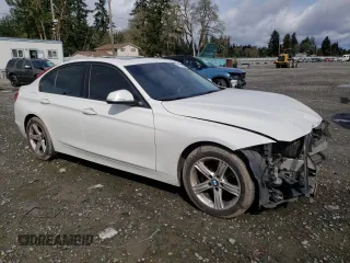 2014 BMW 3 Series 328i with VIN WBA3C1C53EK105495, listed as a Copart auction lot 52176255 with 154,122 mi miles and Salvage Title. Bid and sale history available at carsss.com. Image 4.