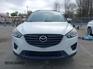 2013 Mazda CX-5 Touring with VIN JM3KE2CE0D0105115, listed as a IAAI auction lot 41899956 with 301,264 mi miles. Bid and sale history available at carsss.com. Image 12.