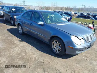 2006 Mercedes-Benz E-Class 3.5L with VIN WDBUF87J86X194028, listed as a IAAI auction lot 41932222 with 144,159 mi miles. Bid and sale history available at carsss.com. Image 1.