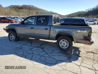 2004 Dodge Dakota Sport z VIN 1D7HG38K94S556894, wystawiony jako Copart lot #79743994 z przebiegiem 174 933 mil mil oraz Szkoda całkowita • Salvage title. Historia ofert i sprzedaży dostępna na DreamBid. Obrazek 2.