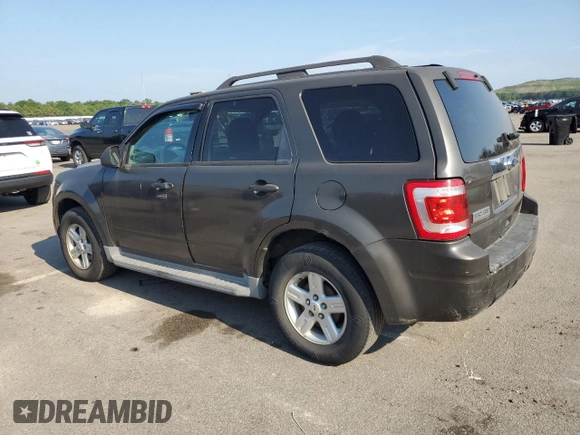 2011 Ford Escape Hybrid with VIN 1FMCU4K35BKA16469, listed as a Copart auction lot 65811905 with 401,583 mi miles and Clean title. Bid and sale history available at DreamBid. Image 2.