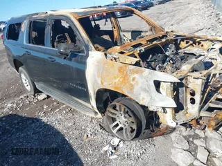 2015 Chevrolet Suburban LT z VIN 1GNSKJKC5FR587209, wystawiony jako IAAI lot #42216123 z przebiegiem Nie podano mil oraz . Historia ofert i sprzedaży dostępna na DreamBid. Obrazek 1.