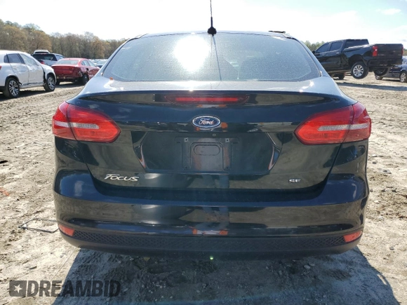 2015 Ford Focus SE with VIN 1FADP3F26FL228606, listed as a Copart auction lot 52525445 with 37,477 mi miles and Salvage Title. Bid and sale history available at DreamBid. Image 6.