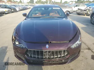 2018 Maserati Ghibli with VIN ZAM57XSA0J1286682, listed as a Copart auction lot 65457315 with 50,169 mi miles and Salvage title. Bid and sale history available at DreamBid. Image 5.