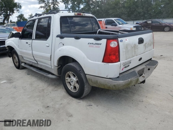 2003 Ford Explorer Sport Trac XLS with VIN 1FMZU67E43UB37127, listed as a Copart auction lot 58377075 with 219,033 mi miles and Salvage title. Bid and sale history available at DreamBid. Image 2.