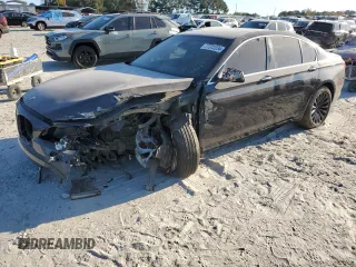 2011 BMW 7 Series 740i with VIN WBAKA4C51BC612629, listed as a Copart auction lot 77372234 with 164,471 mi miles and Salvage Title. Bid and sale history available at carsss.com. Image 1.