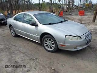 2001 Chrysler LHS z VIN 2C3HC56G81H540175, wystawiony jako IAAI lot #41751981 z przebiegiem 212 941 mil mil oraz . Historia ofert i sprzedaży dostępna na DreamBid. Obrazek 1.