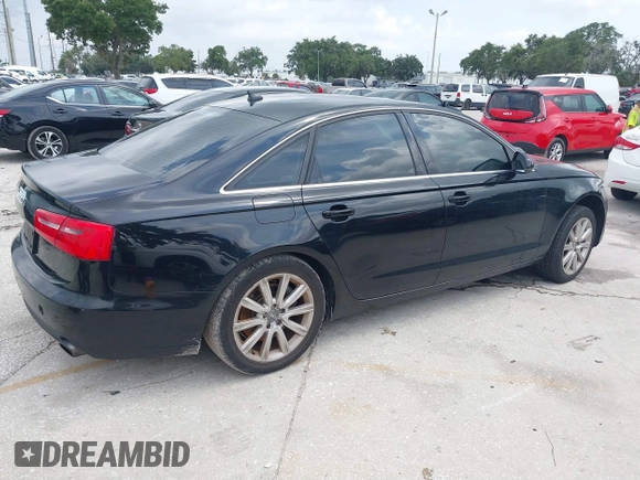 2015 Audi A6 Premium с VIN WAUCFAFC4FN025561, выставлен на аукционе IAAI как лот 40055184 с пробегом 99 744 миль миль и . История ставок и продаж доступна на DreamBid. Изображение 4.