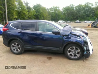 2019 Honda CR-V EX z VIN 7FARW1H51KE022321, wystawiony jako IAAI lot #42311602 z przebiegiem 58 776 mil mil oraz . Historia ofert i sprzedaży dostępna na DreamBid. Obrazek 13.