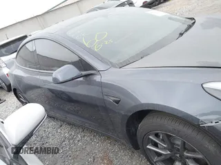 2023 Tesla Model 3 z VIN 5YJ3E1EAXPF403095, wystawiony jako IAAI lot #42151764 z przebiegiem 17 872 mil mil oraz . Historia ofert i sprzedaży dostępna na DreamBid. Obrazek 13.