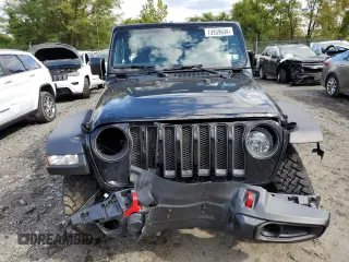 2023 Jeep Wrangler Rubicon with VIN 1C4HJXCGXPW545938, listed as a Copart auction lot 73939634 with 13,590 mi miles and Salvage title. Bid and sale history available at DreamBid. Image 5.