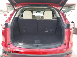 2016 Mazda CX-9 Touring with VIN JM3TCACY4G0112961, listed as a IAAI auction lot 42094718 with 114,679 mi miles and . Bid and sale history available at DreamBid. Image 17.